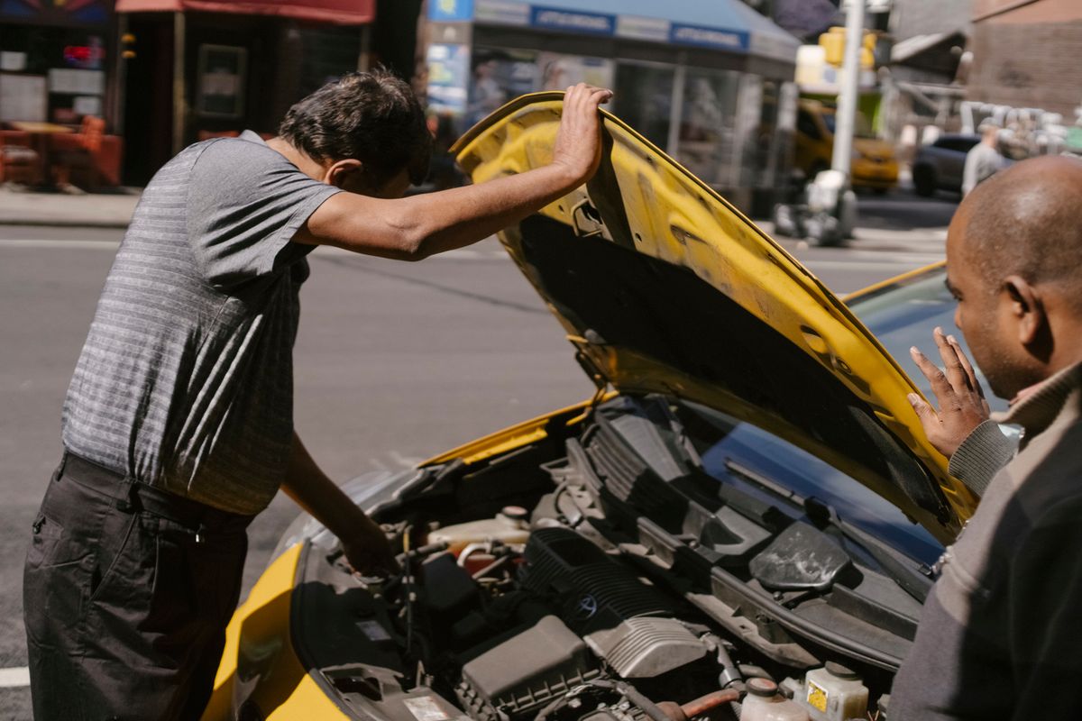 A driver with a broken-down car